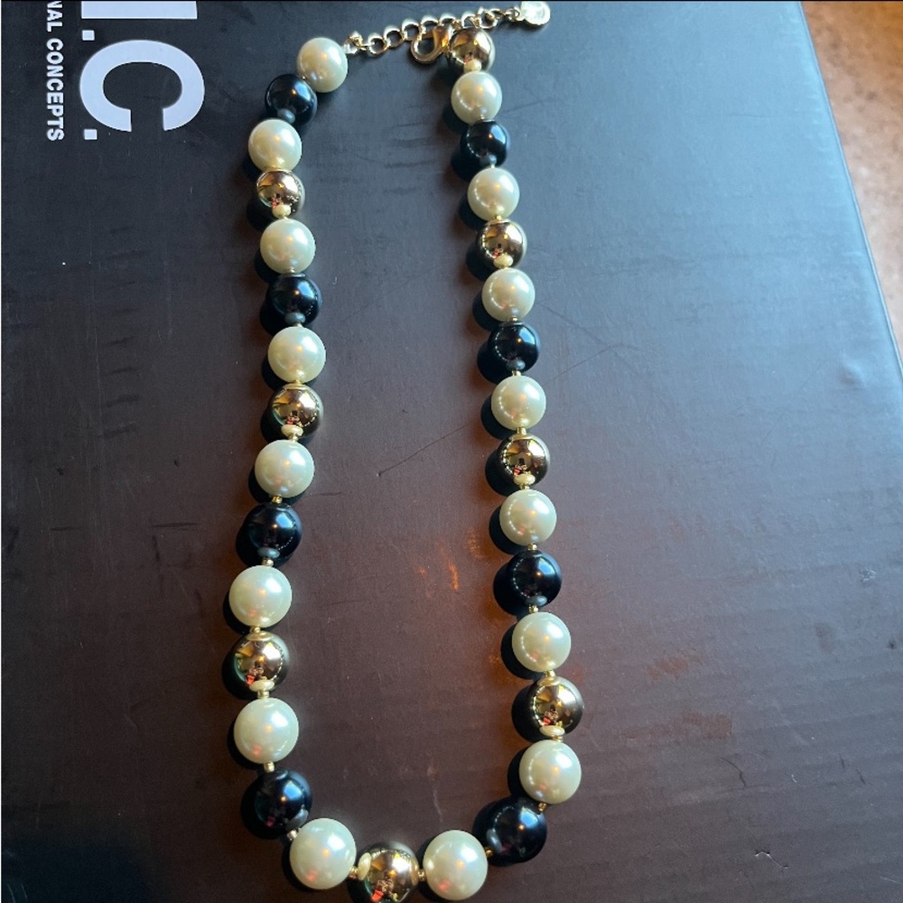 Black, gold and off white Pearl necklace. Never worn